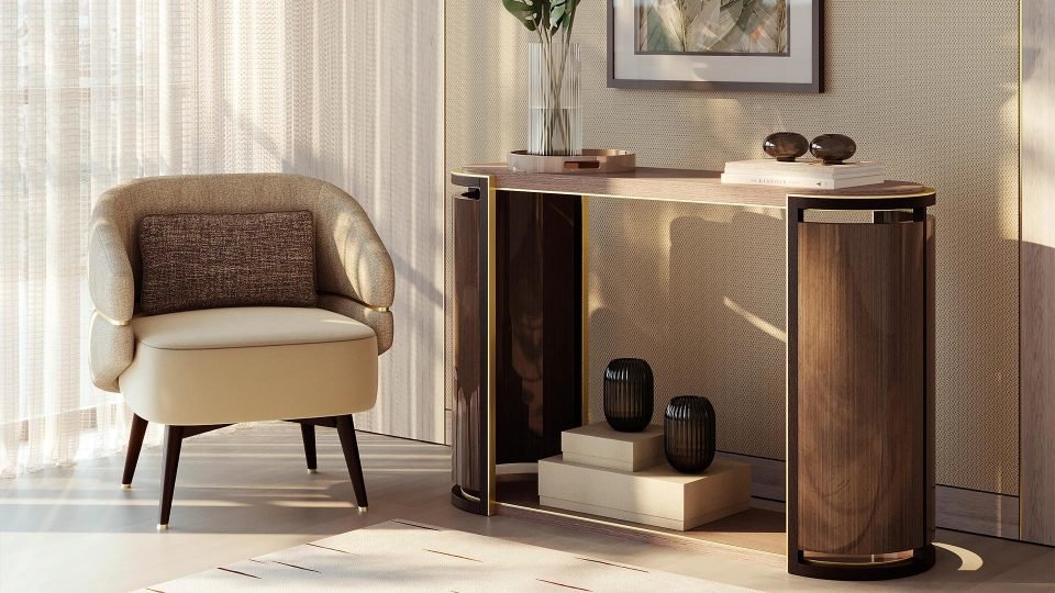 Styled vignette with a walnut console table, boucle armchair and black ceramic vases