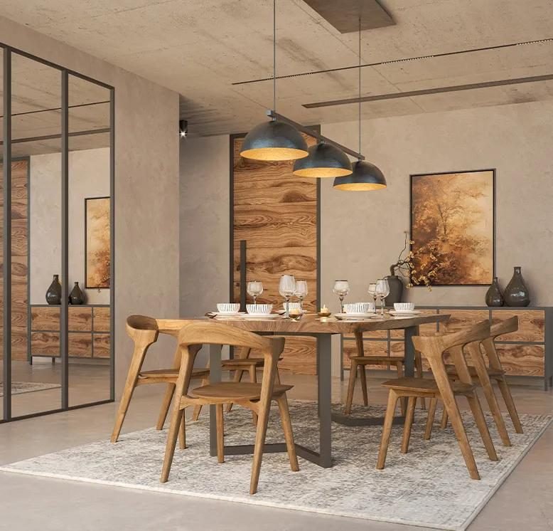 Dining room with blue industrial pendants, oak table and wood accent wall