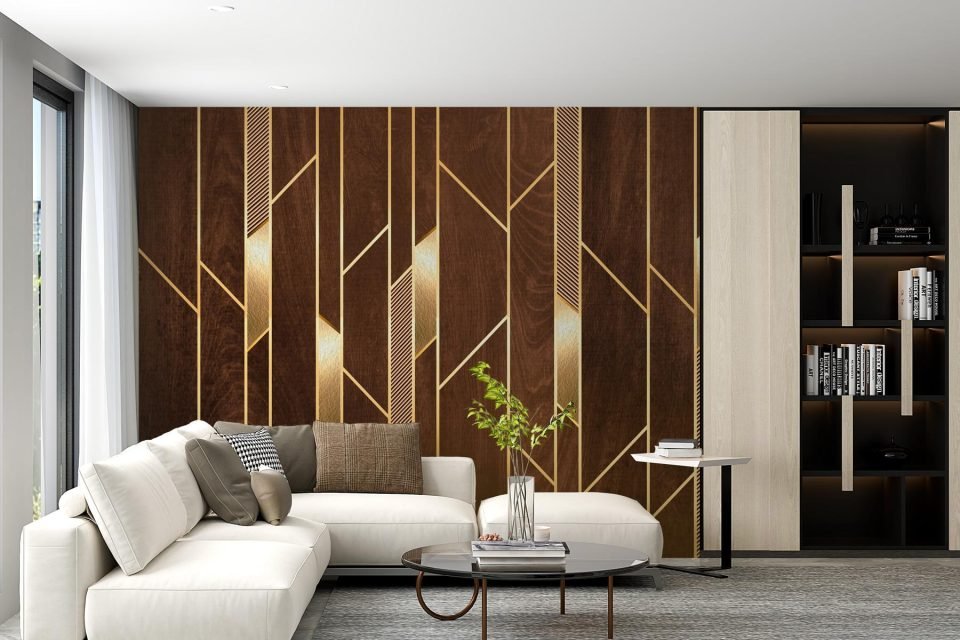 Walnut feature wall with gold geometric inlays behind a white sectional sofa and open shelving