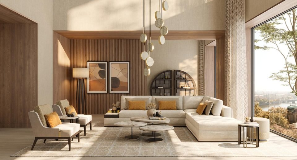 Living room with a pendant cluster, timber slat wall, cream sectional and amber cushions